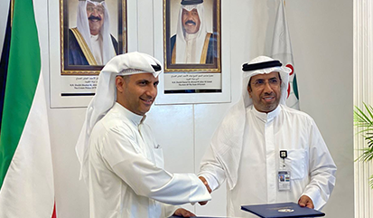 المرزوق والعازمي بعد توقيع الاتفاقية